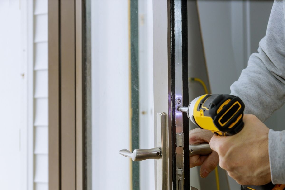 Locksmith providing service at a commercial building