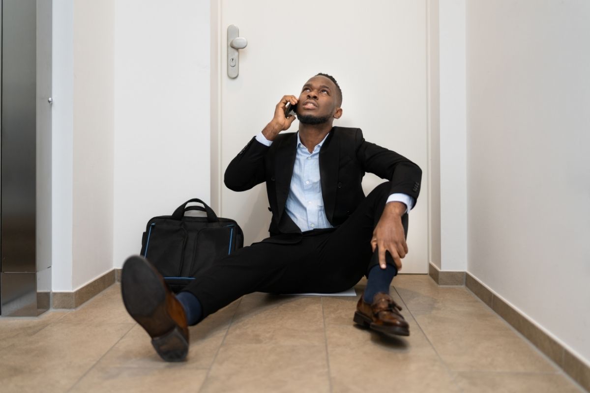 Man calling emergency locksmith for lockout
