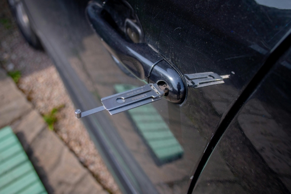 Lock pick stuck in a car door.