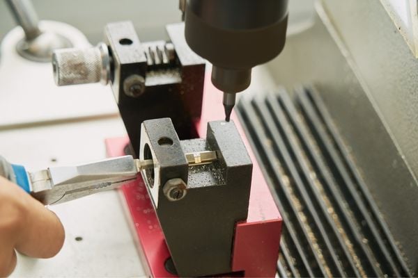 Locksmith crafting replacement key from code