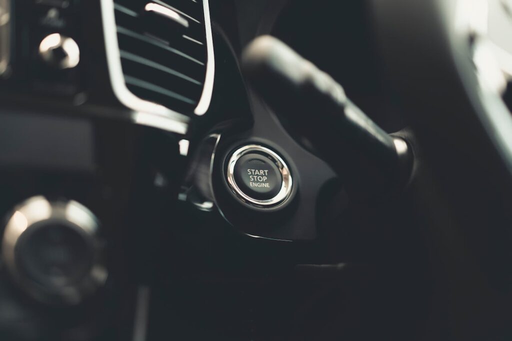Close-up photo of a keyless car's start and stop button