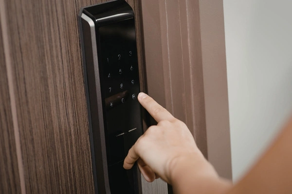 Installing modern smart door lock.